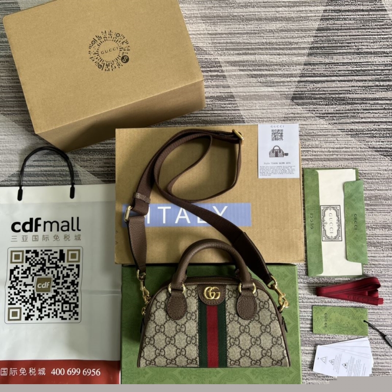 G*u*i top handle bags